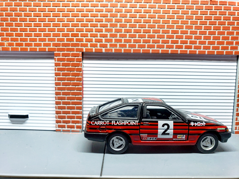 Somehow Tsuchiya-san got this old race car street legal. Now he’s dropping by his favorite shop to visit some old friends.